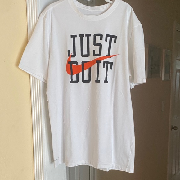 Nike Other - Nike White Tee with Black and Orange Slogan